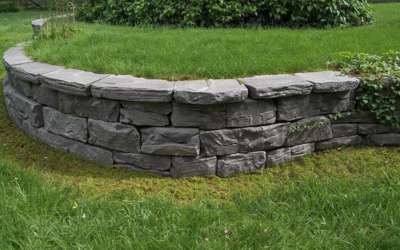 Stop a Retaining Wall From Reducing Lawn Space