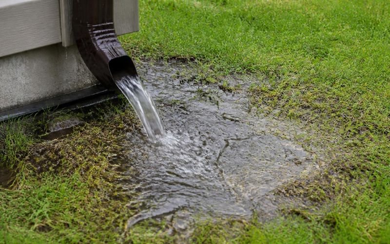 Downpipe causing backyard water pooling